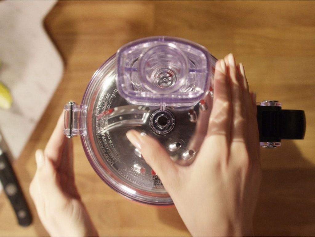 Food-processors-1.7L-women-assembles-a-food-processor.jpg